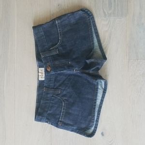 Frankie B. dark denim dolphin tail hemmed shorts, size 6